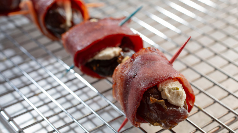 Devils on Horseback on a baking rack