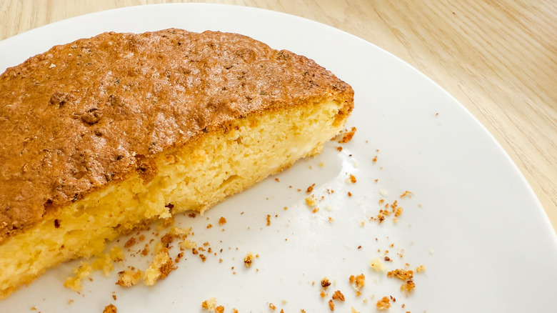 half of pan of cornbread on a plate
