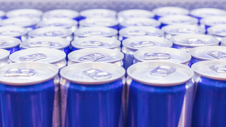 Top view of rows of Red Bull cans