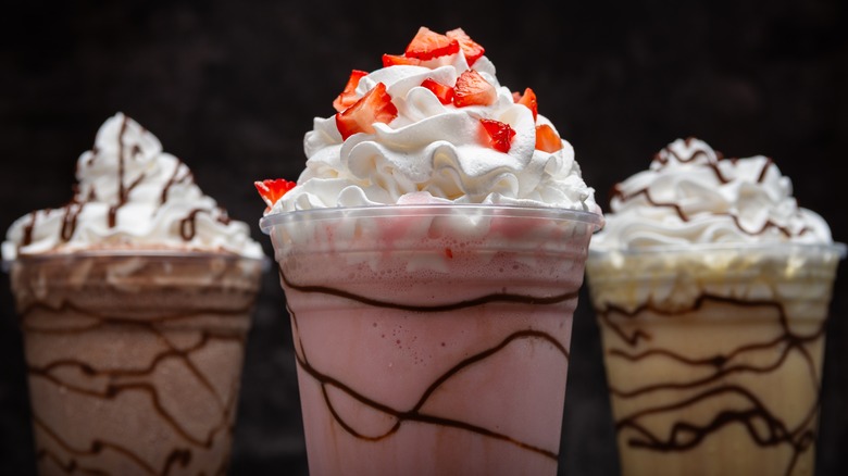 Chocolate, vanilla, and strawberry milkshakes