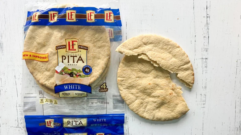 L'Oven Fresh pita bread on white background