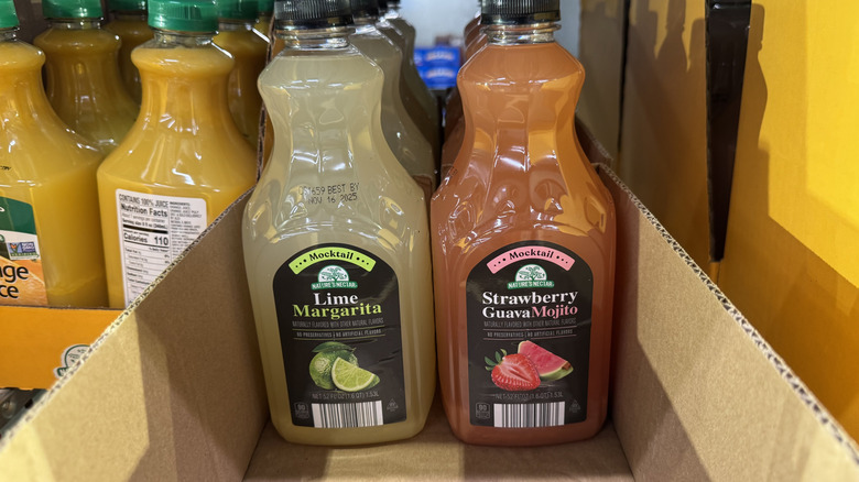 Two containers of mocktail mix in plastic containers