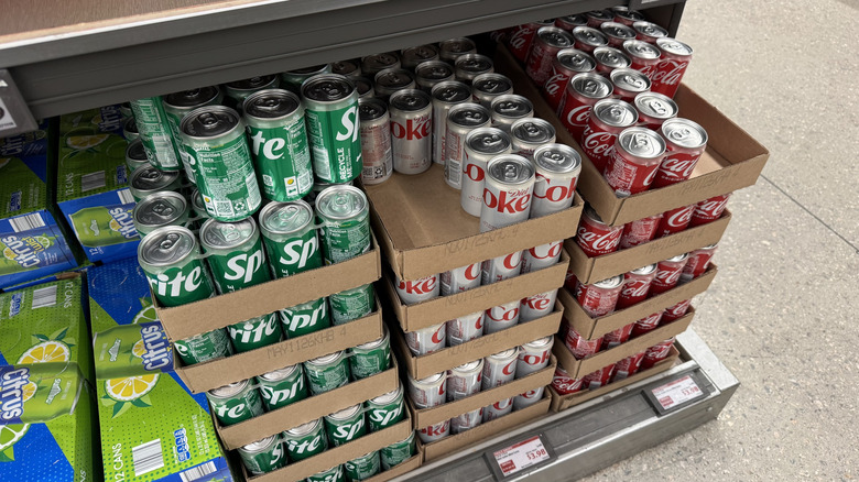 Small cans of soda in grocery store