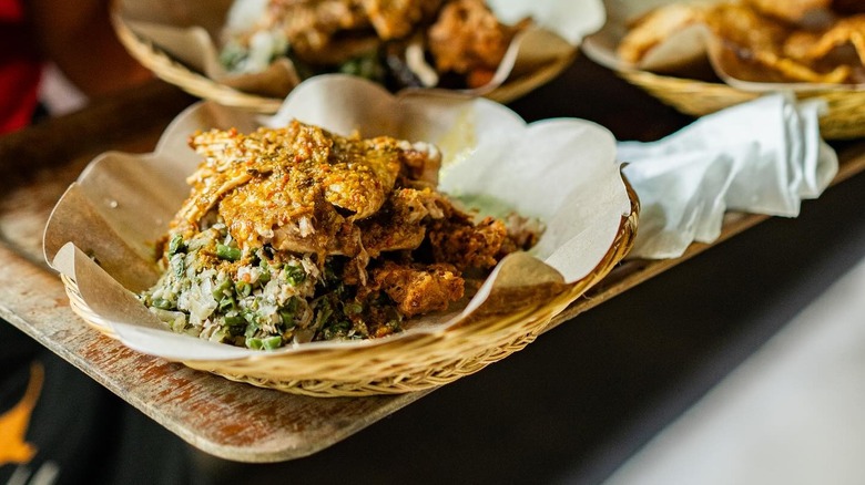 A basket of roast suckling pig at Ibu Oka in Bali