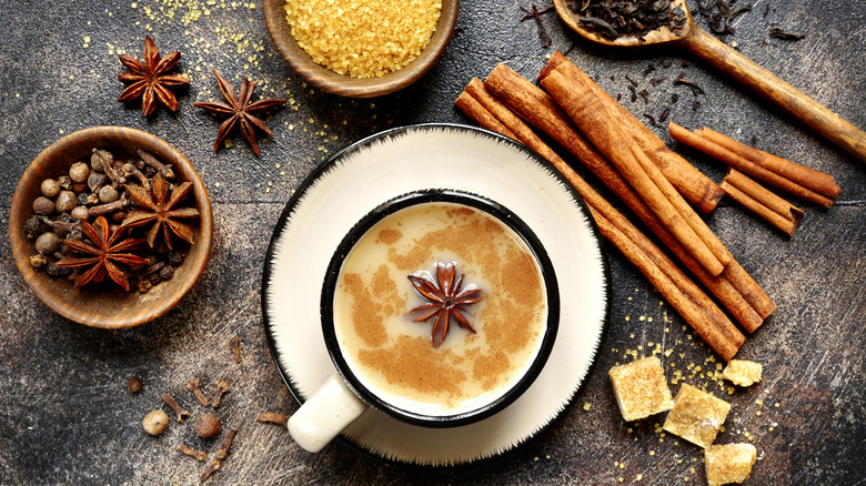 Chai spices with mug of chai tea