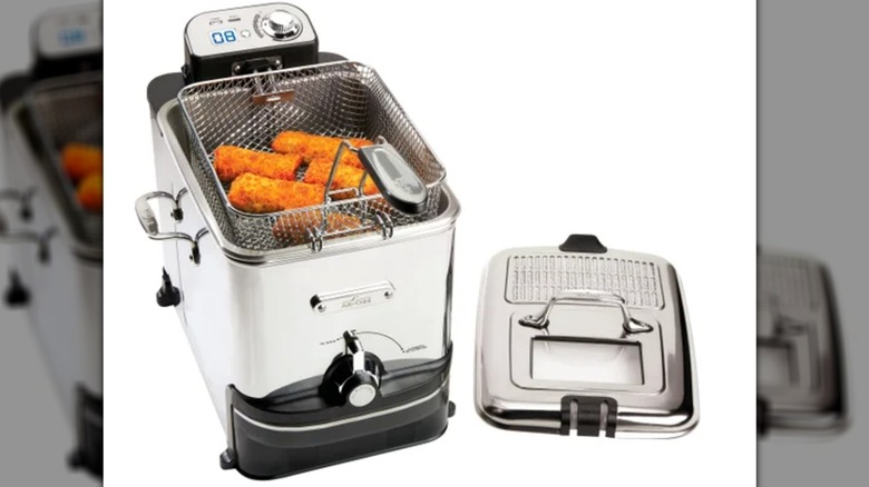 deep fryer with fried food inside the basket