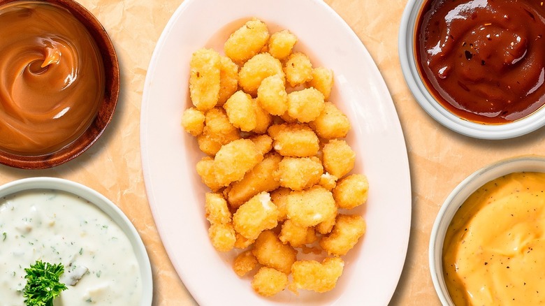 fried cheese curds and an array of dipping sauces