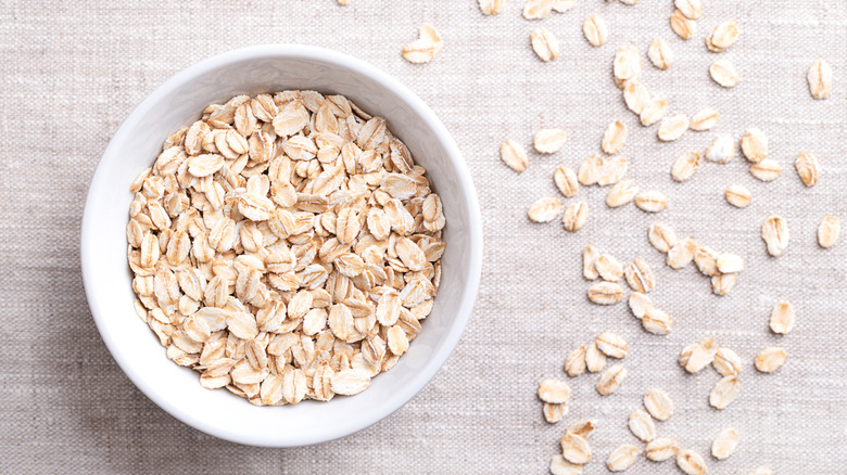 Bowl of dry oatmeal.