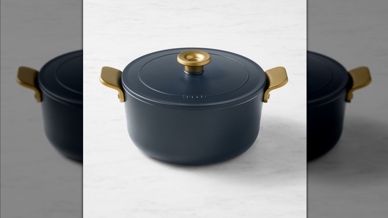 A sleek Dutch oven with gold hardware