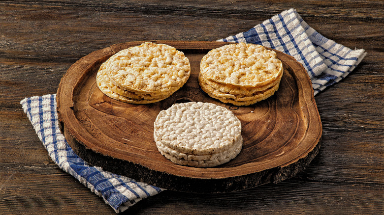 Assorted rice cakes on rustic wooden background