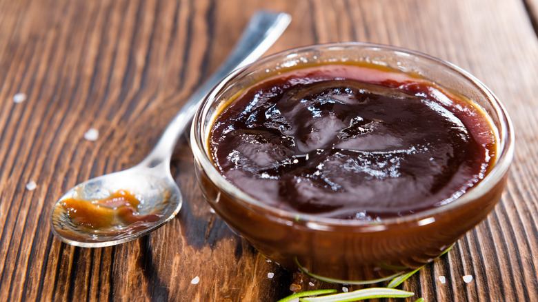 Barbecue sauce with a spoon