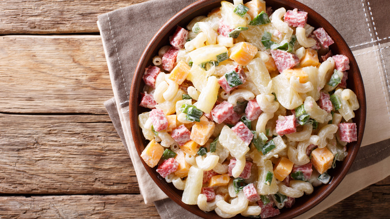 Meat salad in a bowl with pasta