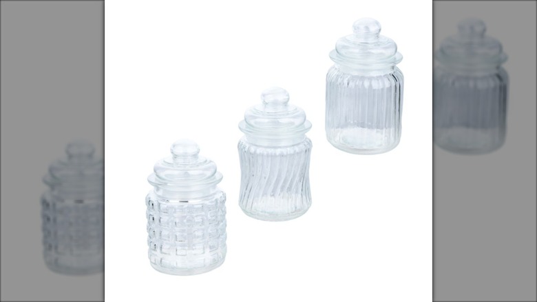 Old-fashioned glass candy jars with lids