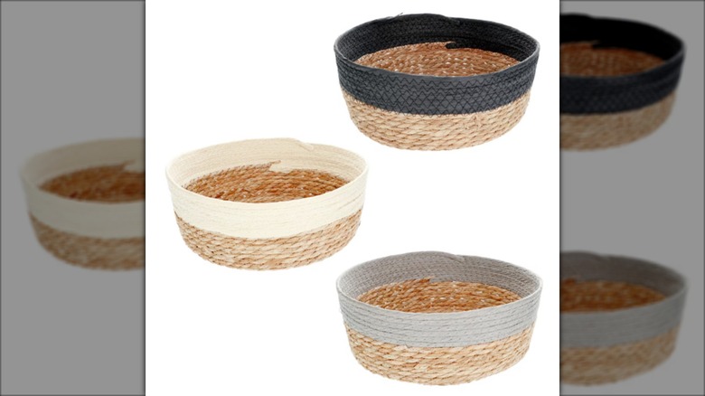 Three woven round baskets