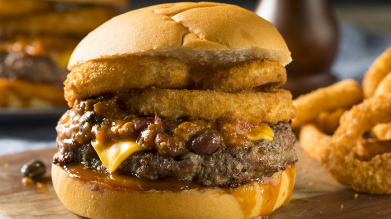 Barbecue chili cheeseburger with onion rings