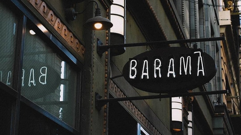 The exterior sign for Bar Amá