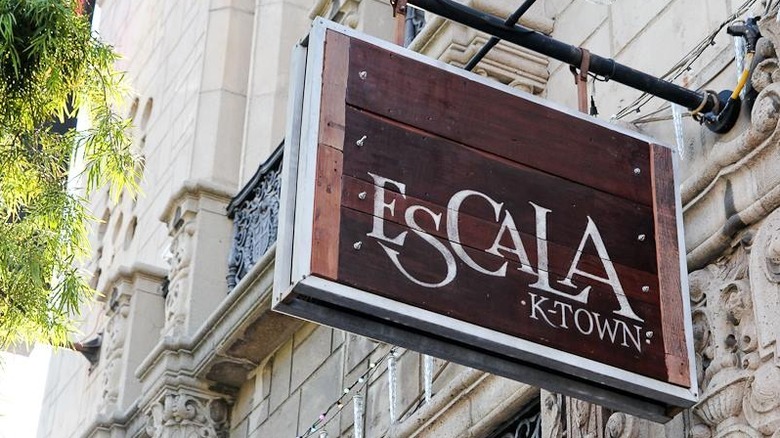 The sign outside of Escala