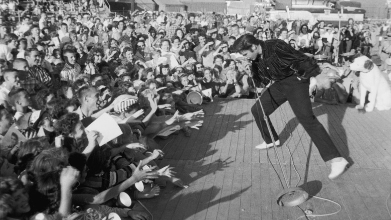 Elvis singing to a crowd