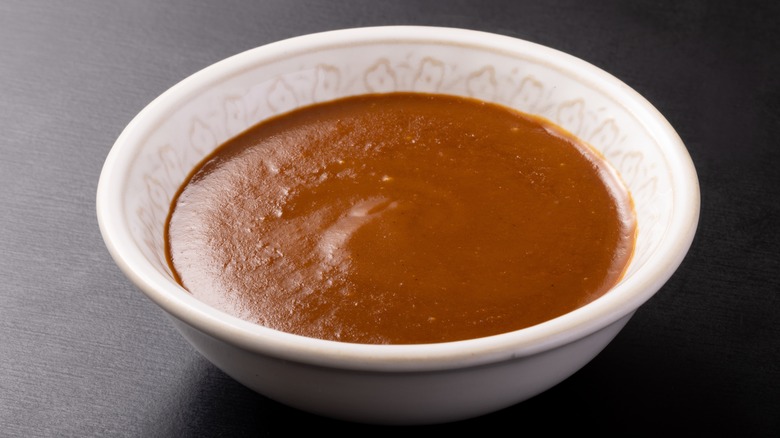 A bowl of espagnole sauce