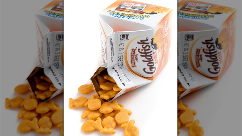 An opened carton spills out Goldfish crackers