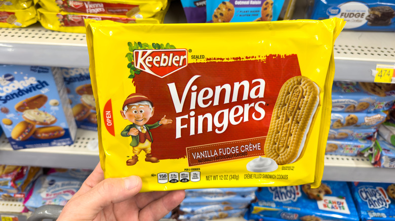 A shopper holds a package of Vienna Fingers