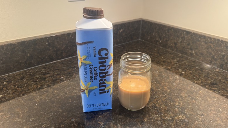 Vanilla coffee creamer with glass
