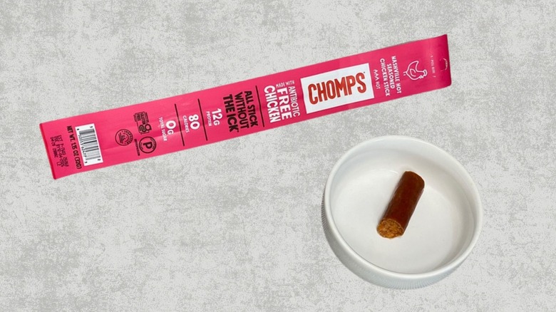 Nashville Hot Chicken stick next to a sample on a table