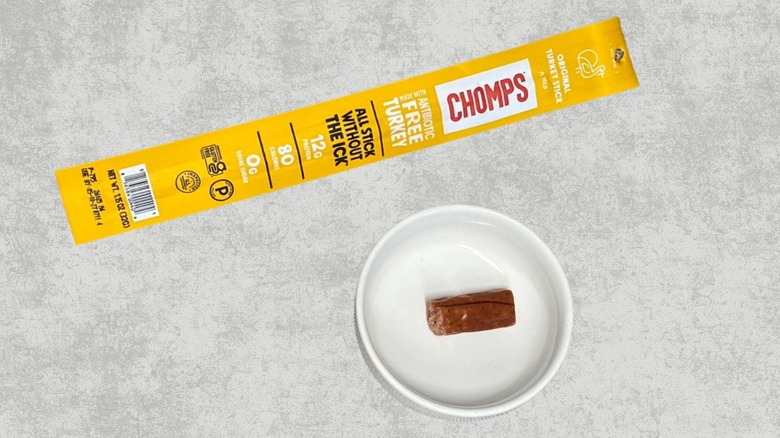 Chomps Original Turkey stick with a sample on a table
