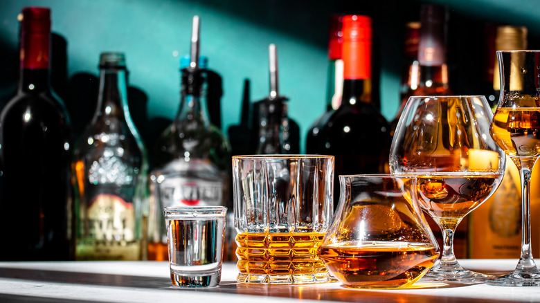 Spirits with cocktail selection and glasses