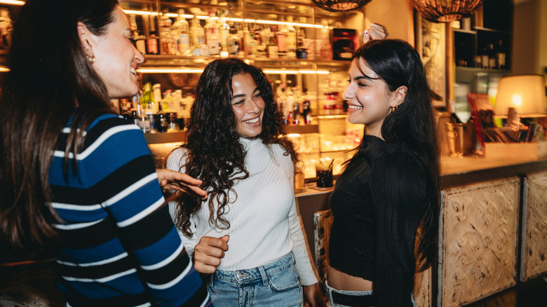 Friends together at a bar