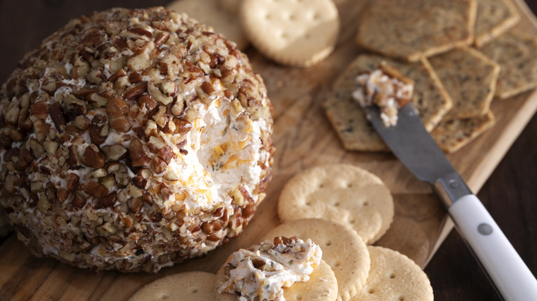 A cheeseball with crackers.
