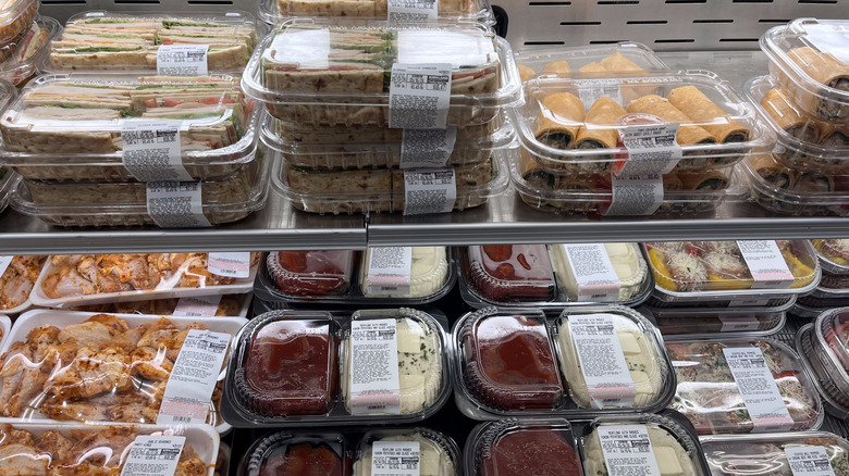 Shelves of prepared sushi and sashimi in the Costco deli