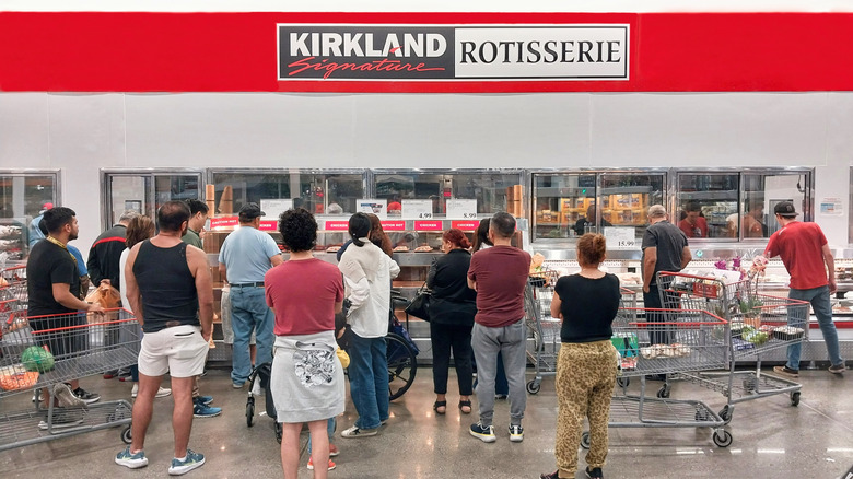Costco customers milling about the deli department