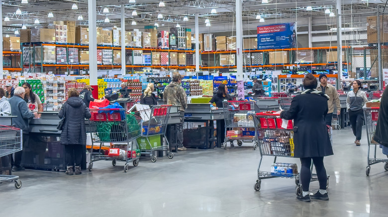 Customers waiting in line to check out at Costco