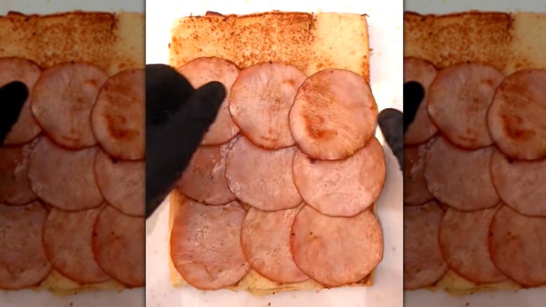 Sheet of Hawaiian rolls with Canadian bacon