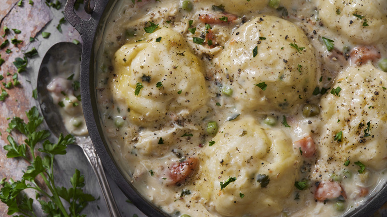 Chicken and dumplings in a pot