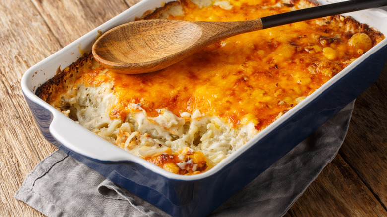 Breakfast casserole with eggs and a spoon