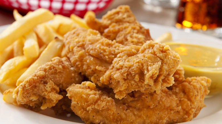 Battered fried chicken with french fries