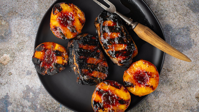 Grilled peaches with pork chops