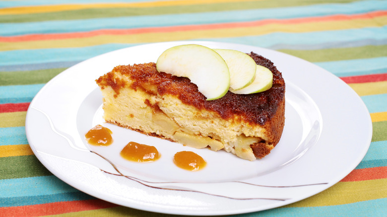 Peach sauce with cake on plate