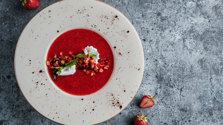 Strawberries with peaches in a bowl