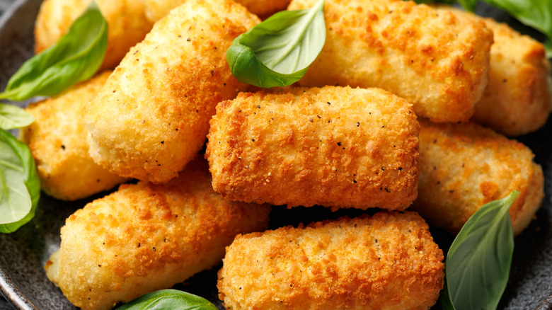 Fried potato croquettes on a plate