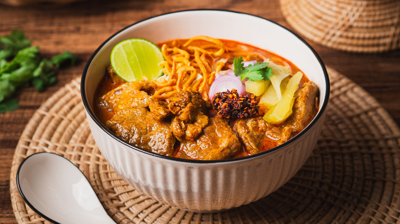 Bowl of curry with noodles