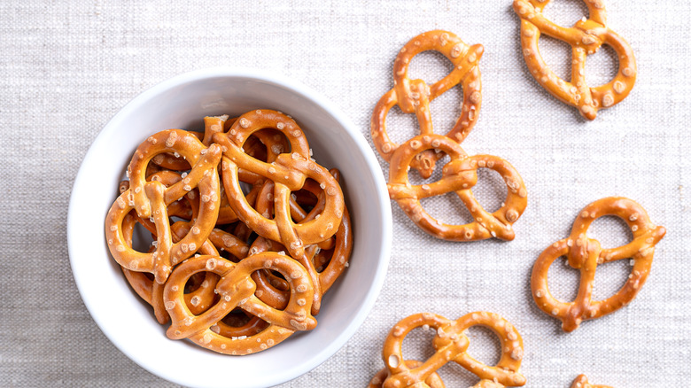 Bowl of pretzels on linen surface