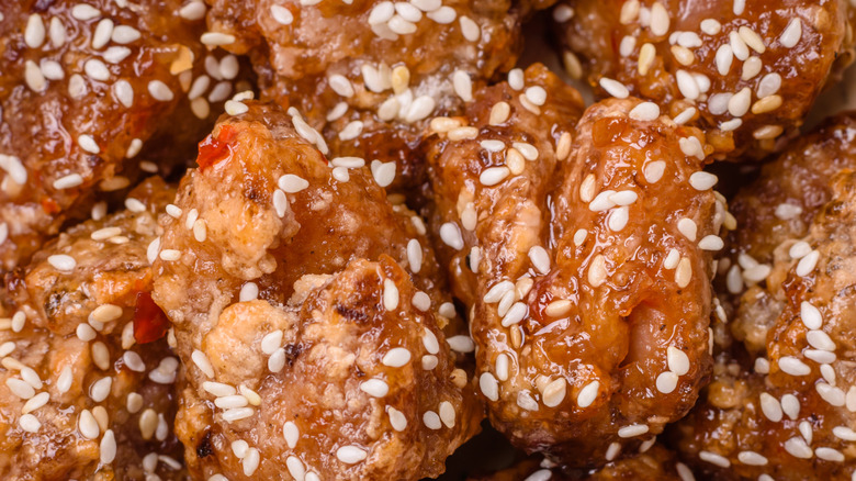 a close-up of sesame chicken