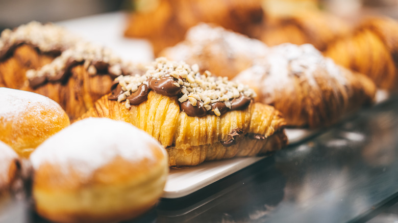up-close of pastries on display at bakery