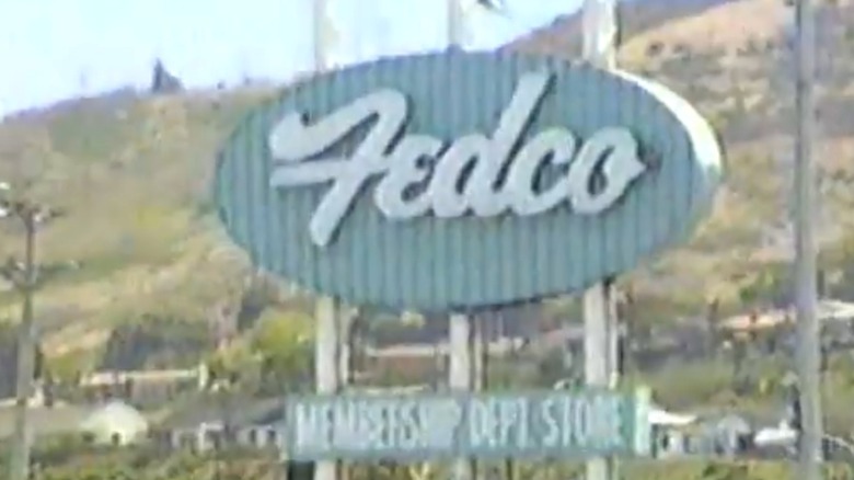 Sign for Fedco in parking lot.