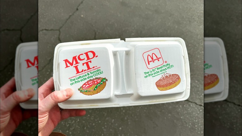 The original McDLT packaging being held by someone.