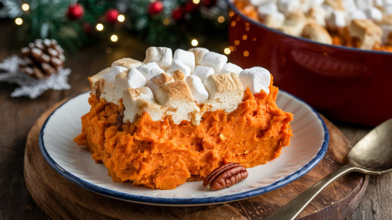 A slice of sweet potato casserole on a plate
