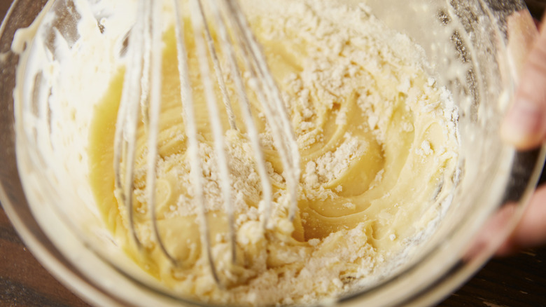 Bowl of cake mix with whisk